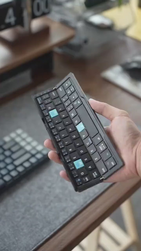 Mini portable foldable Bluetooth wireless keyboard